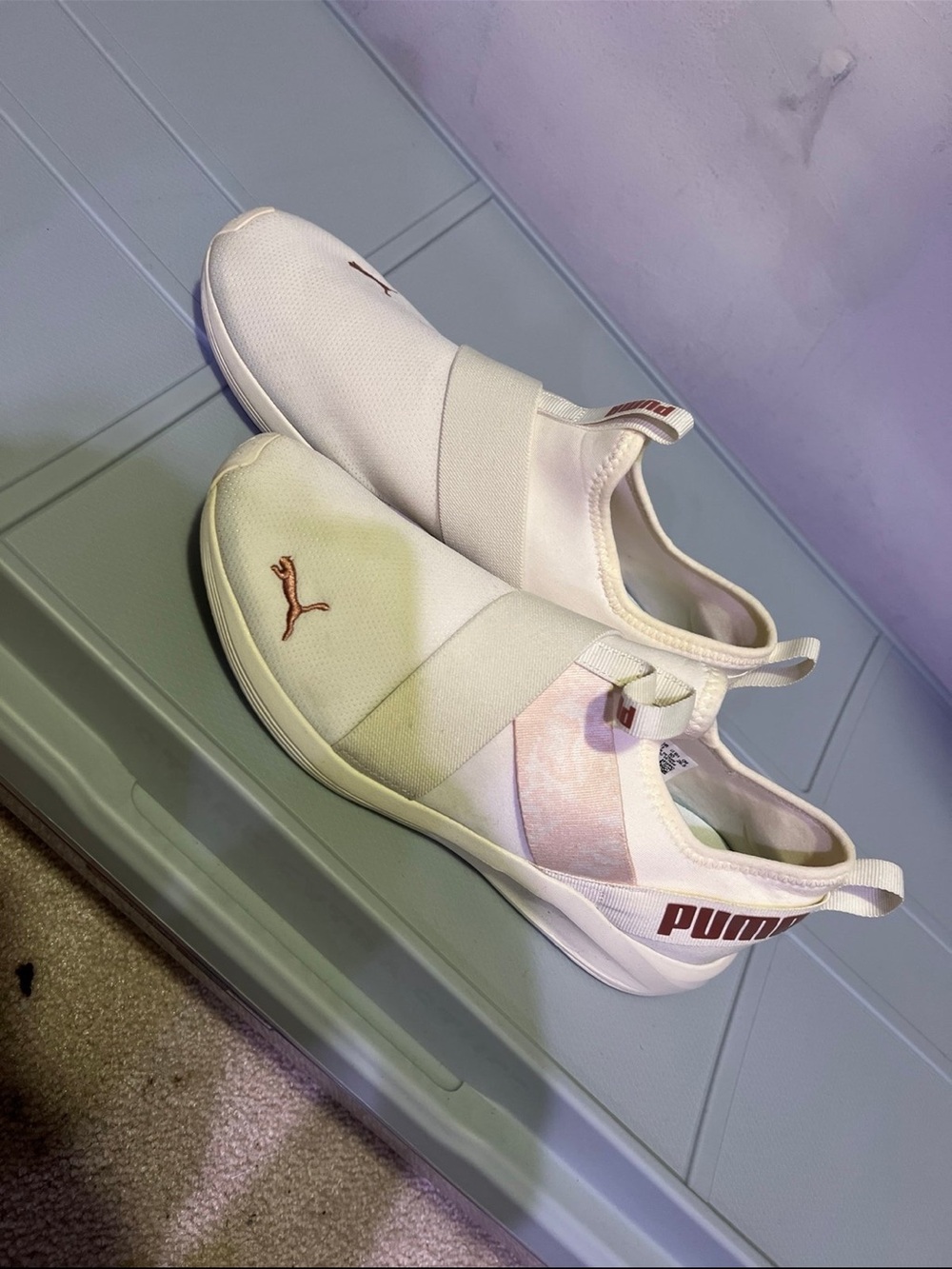 Puma Women’s White Slip-On Sneakers with Rose Gold Logos